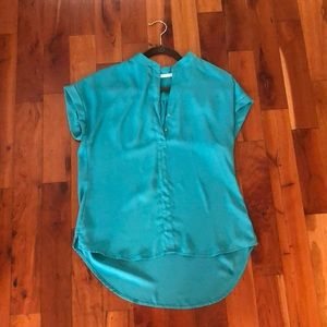 A turquoise blouse